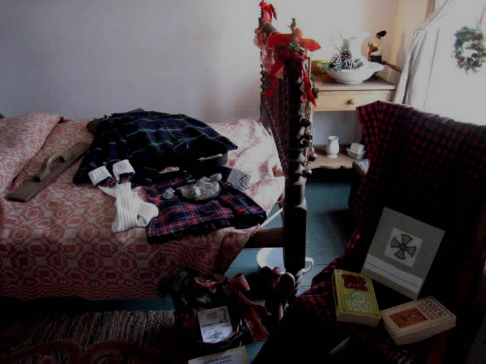 A bedoom displays Irish mementos.