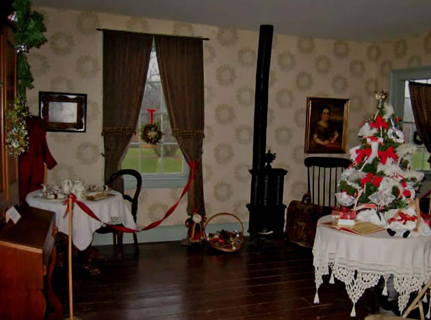 Yje Ladies parlor is decotated with a Victorian English display